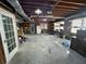 Spacious workshop in basement with shelving and workbench at 1958 Stonewood Dr, Lithia Springs, GA 30122