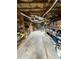 Unfinished basement with shelving for storage at 1958 Stonewood Dr, Lithia Springs, GA 30122
