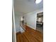 Upstairs hallway with hardwood floors and access to bedrooms at 1958 Stonewood Dr, Lithia Springs, GA 30122