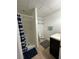 Clean basement bathroom with shower and vanity at 1958 Stonewood Dr, Lithia Springs, GA 30122