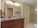 Basement bathroom with marble vanity, glass shower, and neutral colors at 1620 Silverleaf Way, Alpharetta, GA 30005