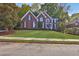 Brick two-story home with manicured lawn at 1620 Silverleaf Way, Alpharetta, GA 30005