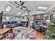 Bright living room featuring hardwood floors, fireplace, and ample seating at 263 Mountainview Cir, Canton, GA 30115