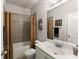 Bathroom with tub shower and grey tile at 2536 Skyland Ne Dr, Atlanta, GA 30319