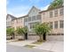 Row of three story townhouses with attached garages at 2536 Skyland Ne Dr, Atlanta, GA 30319