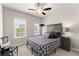 Spacious bedroom with ceiling fan, large windows, and plush carpeting at 2536 Skyland Ne Dr, Atlanta, GA 30319