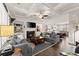 Open living room featuring a fireplace, built-in shelving, and kitchen views at 2536 Skyland Ne Dr, Atlanta, GA 30319
