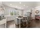 Modern kitchen with white cabinets, granite island and stainless steel appliances at 2536 Skyland Ne Dr, Atlanta, GA 30319