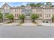 Row of three story townhouses with attached garages at 2536 Skyland Ne Dr, Atlanta, GA 30319