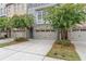 Townhouses with 2-car garages, landscaping, and a quiet street at 2536 Skyland Ne Dr, Atlanta, GA 30319