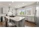 Modern kitchen with white cabinets and granite island at 2536 Skyland Ne Dr, Atlanta, GA 30319