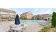 Community pool with lounge chairs and a pergola at 2536 Skyland Ne Dr, Atlanta, GA 30319