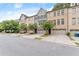 Row of three story townhouses with attached garages at 2536 Skyland Ne Dr, Atlanta, GA 30319