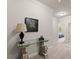 Elegant hallway with glass-top console table and framed artwork at 2536 Skyland Ne Dr, Atlanta, GA 30319