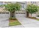 Townhouses with 2-car garages, landscaping, and a quiet street at 2536 Skyland Ne Dr, Atlanta, GA 30319