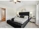 Main bedroom with king-size bed and stylish decor at 2527 Swan Lake Dr, Grayson, GA 30017