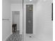 Elegant shower with white subway tile and black hexagon tile feature at 3475 Oak Valley Rd # 2820, Atlanta, GA 30326