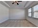 Spacious bedroom with plush carpet and windows offering natural light at 614 Harrington Hls, Decatur, GA 30032