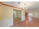 Formal dining room with hardwood floors and chandelier at 3884 Wood Path Dr, Stone Mountain, GA 30083