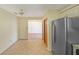 Kitchen with view into dining room and access to pantry at 3884 Wood Path Dr, Stone Mountain, GA 30083