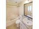 Bathroom with tub, shower, and granite countertop at 3884 Wood Path Dr, Stone Mountain, GA 30083
