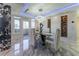 Modern dining room with marble table and wine storage at 3334 Peachtree Ne Rd # 1209 1210, Atlanta, GA 30326