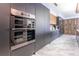 Modern kitchen with built-in oven and sleek cabinetry at 3334 Peachtree Ne Rd # 1209 1210, Atlanta, GA 30326