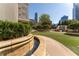 Water feature and lush landscaping at 3334 Peachtree Ne Rd # 1209 1210, Atlanta, GA 30326