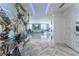 Elegant entryway with marble floors and a silver horse statue at 3334 Peachtree Ne Rd # 1209 1210, Atlanta, GA 30326