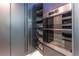 Modern kitchen pantry with pull-out shelves and appliances at 3334 Peachtree Ne Rd # 1209 1210, Atlanta, GA 30326
