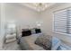 Spacious bedroom, featuring a large bed, soft color palette, and modern lighting at 3334 Peachtree Ne Rd # 1209 1210, Atlanta, GA 30326