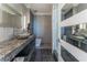 Luxury bathroom with granite countertop, vessel sink, and modern design at 3334 Peachtree Ne Rd # 1209 1210, Atlanta, GA 30326