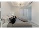 Bright bedroom with a king-size bed, plush bedding, and large window with blinds at 3334 Peachtree Ne Rd # 1209 1210, Atlanta, GA 30326