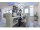 Elegant dining room featuring a marble table and chandelier at 3334 Peachtree Ne Rd # 1209 1210, Atlanta, GA 30326