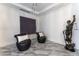 Elegant sitting area with two armchairs and a bronze statue at 3334 Peachtree Ne Rd # 1209 1210, Atlanta, GA 30326