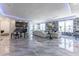 Spacious living room featuring a grand piano and city views at 3334 Peachtree Ne Rd # 1209 1210, Atlanta, GA 30326