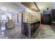 Open concept kitchen with large island and marble countertops at 3334 Peachtree Ne Rd # 1209 1210, Atlanta, GA 30326