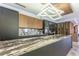 Modern kitchen with expansive marble countertop and wine storage at 3334 Peachtree Ne Rd # 1209 1210, Atlanta, GA 30326