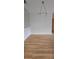 Bright dining room with light walls and hardwood floors at 6851 Roswell Rd # O9, Atlanta, GA 30328