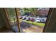 Private balcony with sliding glass doors and view of parking lot at 6851 Roswell Rd # O9, Atlanta, GA 30328