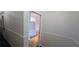 Open doorway reveals built-in shelves and hardwood floors at 6851 Roswell Rd # O9, Atlanta, GA 30328