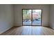Living room features hardwood floors and access to a balcony at 6851 Roswell Rd # O9, Atlanta, GA 30328