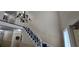 Elegant staircase with ornate railing in the building's entryway at 6851 Roswell Rd # O9, Atlanta, GA 30328