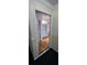 Open doorway to a living area with built-in shelves at 6851 Roswell Rd # O9, Atlanta, GA 30328