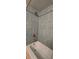 Updated bathroom with a bathtub and shower, featuring stylish tile and gold fixtures at 6851 Roswell Rd # O9, Atlanta, GA 30328