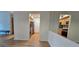 View of kitchen with stainless steel appliances and light wood flooring at 6851 Roswell Rd # O9, Atlanta, GA 30328