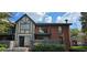 Brick building with balcony and landscaping at 6851 Roswell Rd # O9, Atlanta, GA 30328