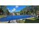 Community tennis courts with blue surface and seating areas at 6851 Roswell Rd # O9, Atlanta, GA 30328
