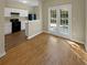 Bright kitchen features dark appliances and access to backyard at 20 Pine Canyon Sw Dr # 24, Atlanta, GA 30331