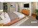 Spacious bedroom with large bed, dresser, and walk-in closet at 20 Pine Canyon Sw Dr # 24, Atlanta, GA 30331